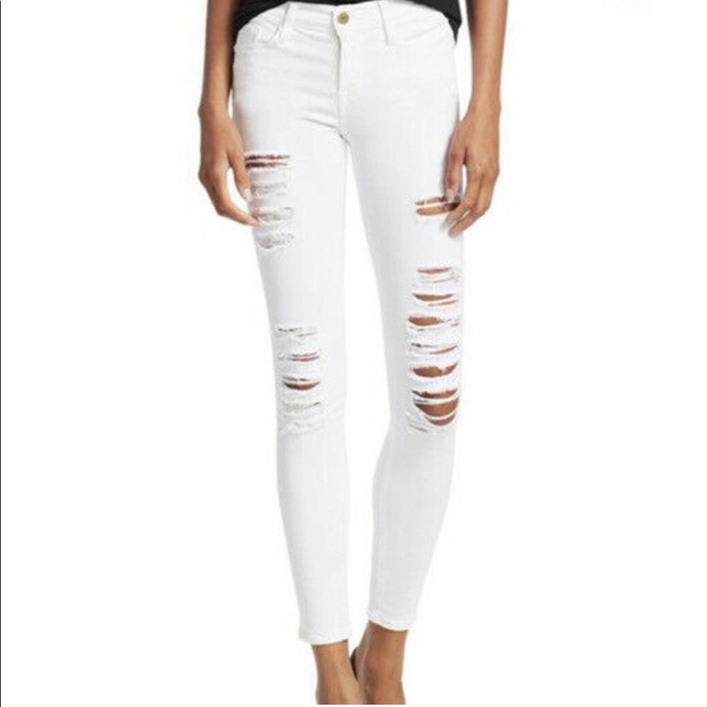 Frame le skinny de jeanne white distressed jeans